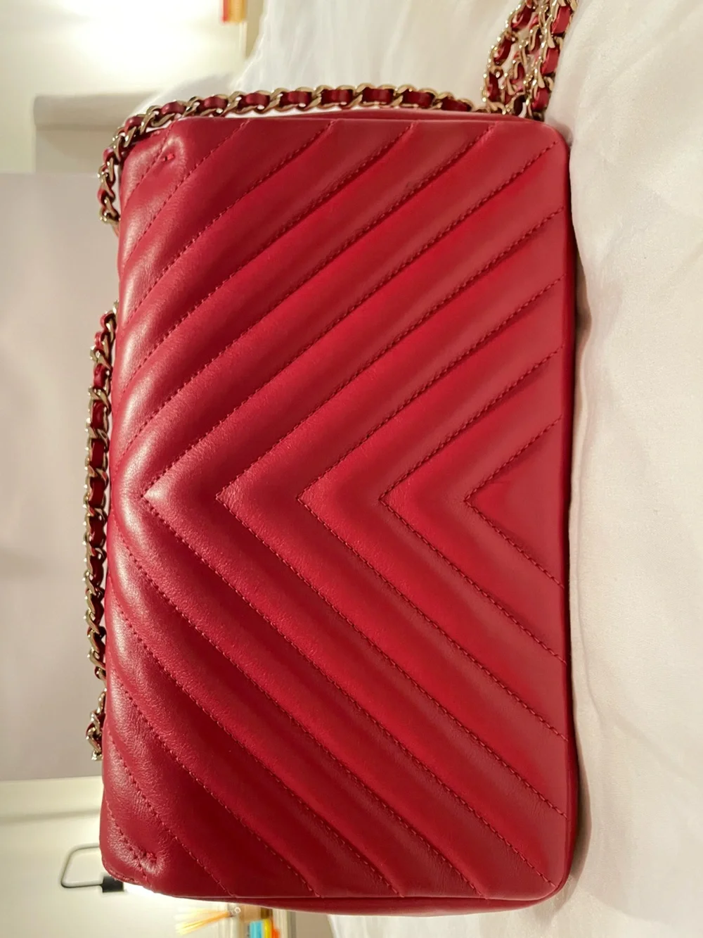 CHANEL Red Quilted Chevron Shoulder Bag with Gold CC Lock